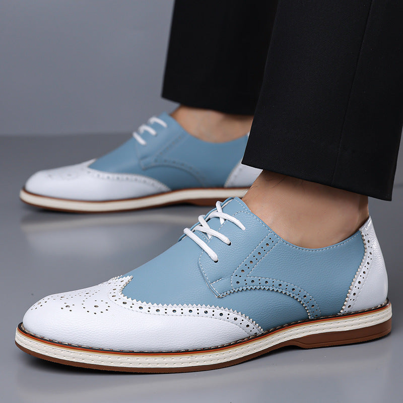 Side profile of lightweight men's brogue dress shoes. Elegant comfort footwear for office and formal events.