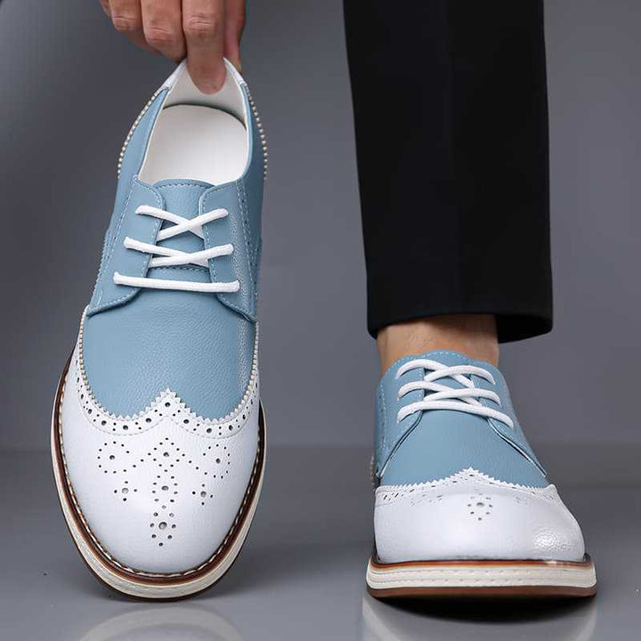 Front view of sophisticated men's brogue dress shoes. Classic design, perfect for formal wear & business casual.