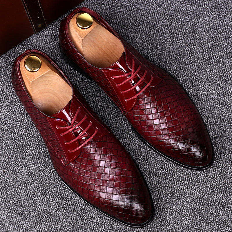 Classic black leather men's lace-up dress shoes, perfect for formal occasions & timeless style.