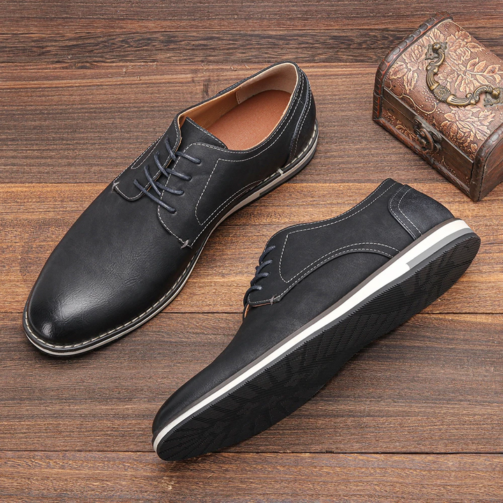 Professional men's Derby shoes, featuring a sleek design and comfortable construction for office wear.