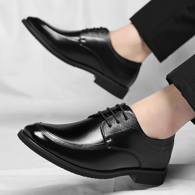Top-down view of men's comfortable professional footwear, designed for classic style and ultimate comfort.