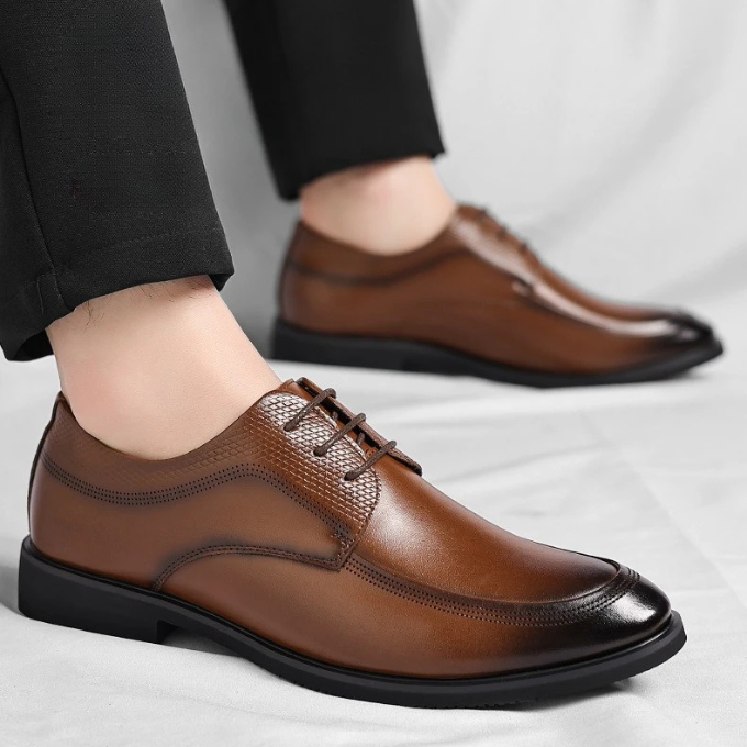 Men's classic style dress shoes, showcasing fine craftsmanship & sleek design for professional footwear.