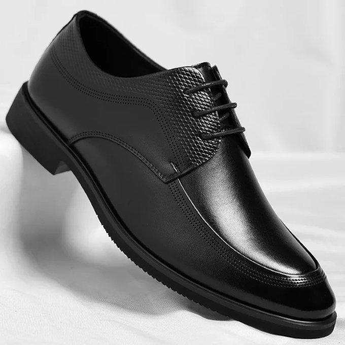 Men's comfortable dress shoes from a side angle, highlighting the classic silhouette and durable build.