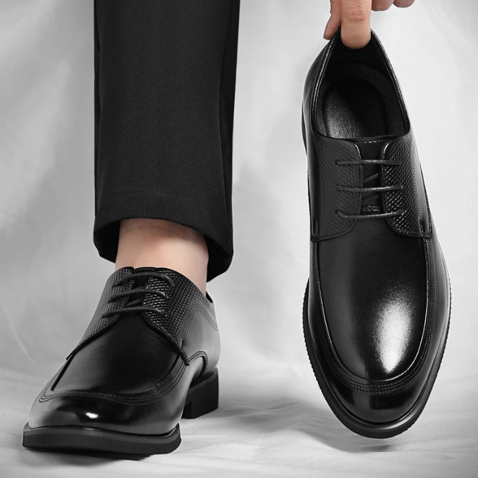 Detail of the slip-resistant sole on men's comfortable office shoes, ensuring safety and professional grip.