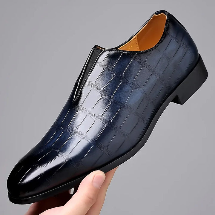 Classic men's dress loafers, offering effortless slip-on style and superior comfort in black.