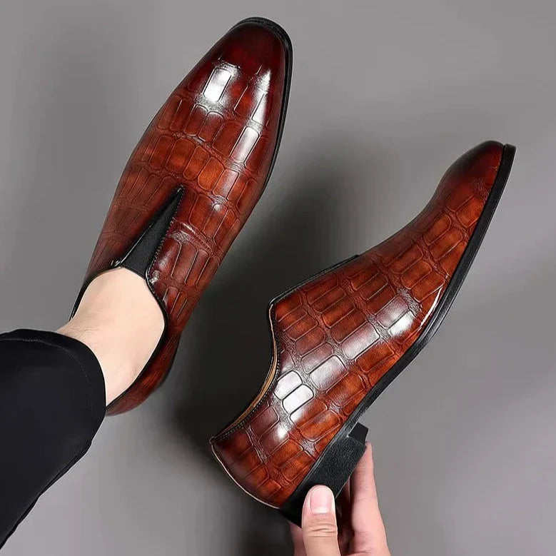 Comfortable brown men's loafers, ideal casual slip-on footwear for effortless style.