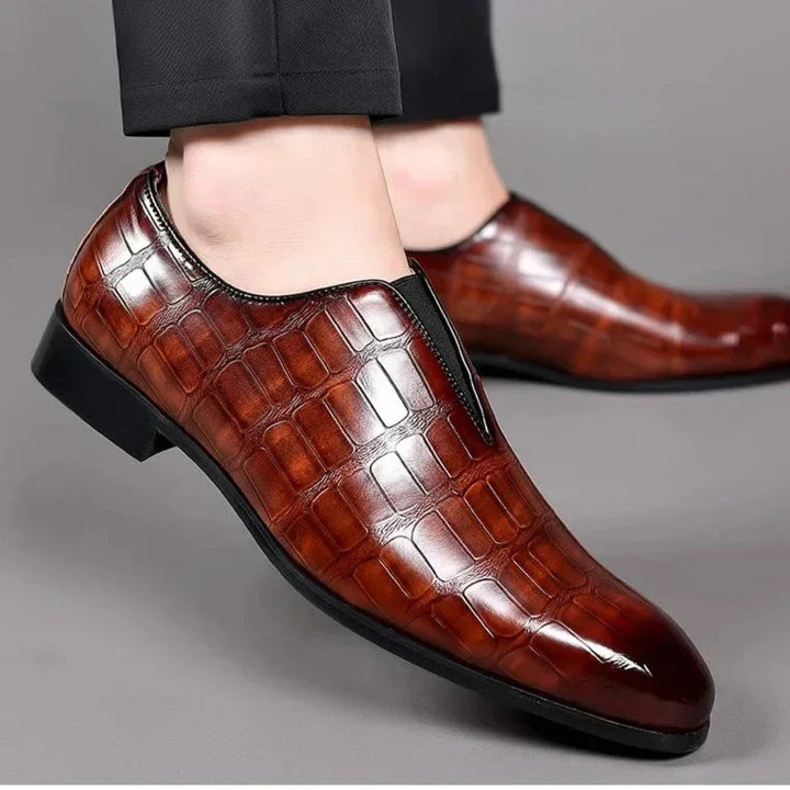 Stylish blue men's loafers, modern slip-on shoes for casual and smart everyday outfits.