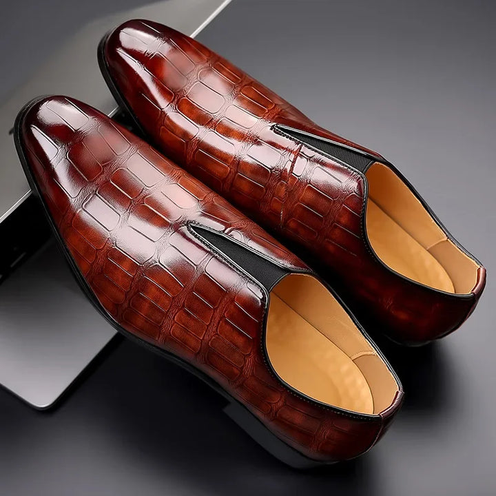 Men's classic brown slip-on loafers offering effortless style and comfort for any occasion.