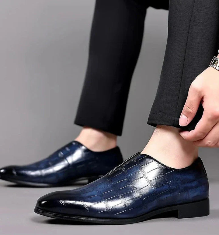 Versatile men's slip-on loafers in a rich brown hue, perfect for casual or smart-casual footwear.