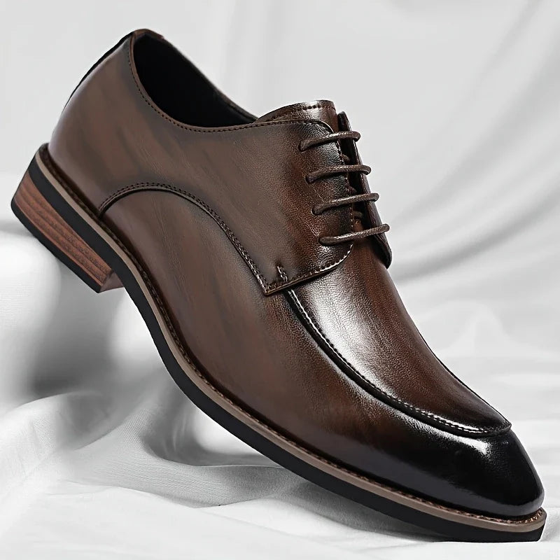 Classic black men's Oxford dress shoes, perfect for formal business wear & professional office attire.