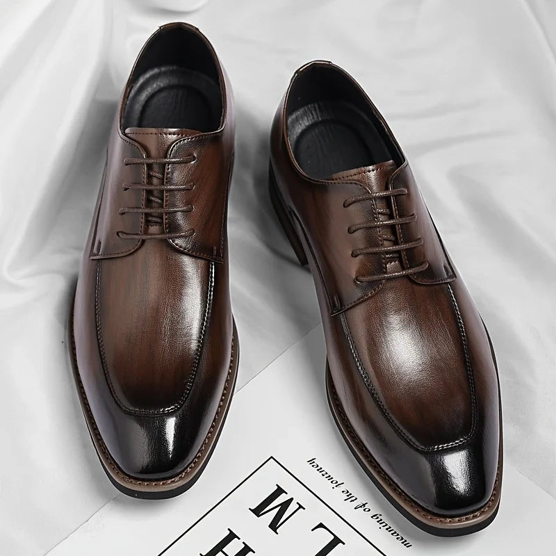 Stylish men's black Oxford dress shoes, offering comfort & classic style for professional and formal occasions.