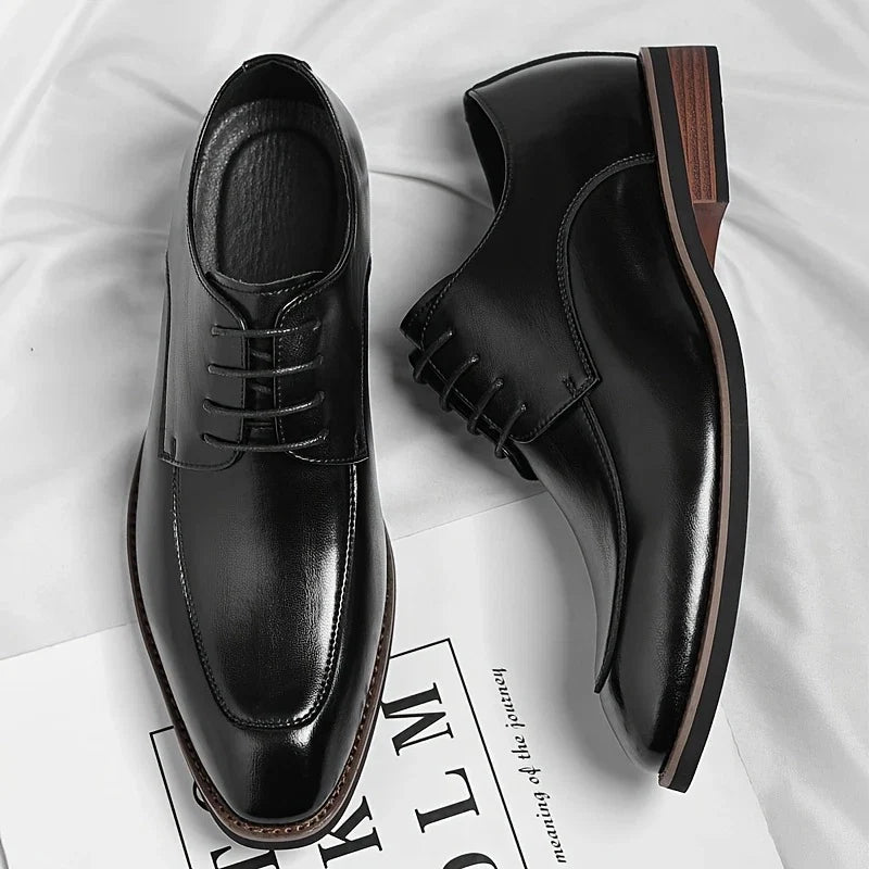 Men's classic Oxford dress shoes in a timeless design, essential formal footwear for the modern professional.