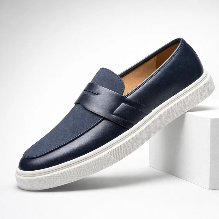 Classic black men's penny loafers, perfect slip-on dress shoes for everyday style & comfort.