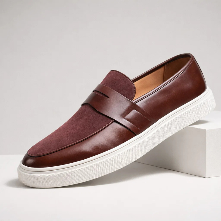 Men's black penny loafers, a timeless classic style for versatile dress or casual wear.