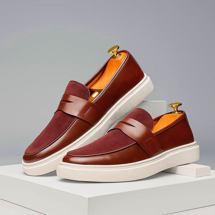 Comfortable men's navy slip-on loafers, ideal everyday casual footwear with classic style.