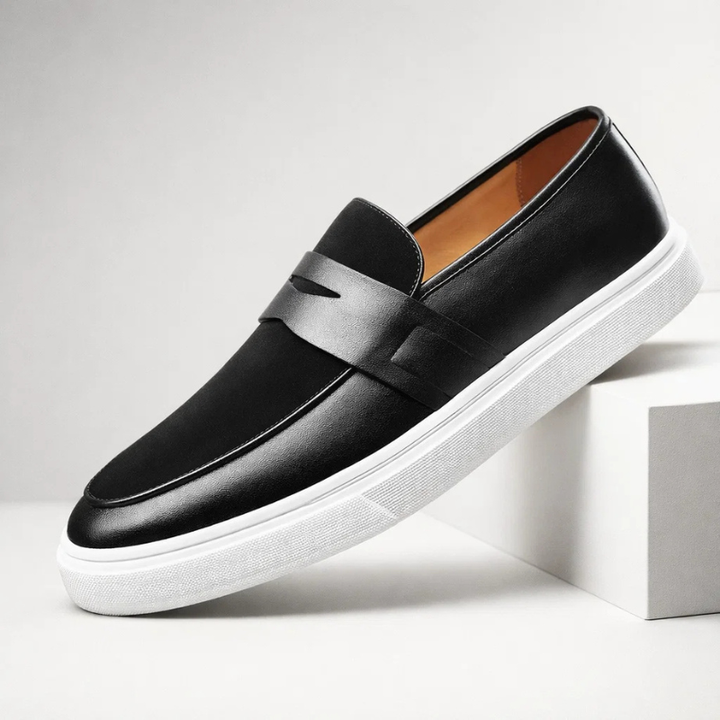 Versatile black men's loafers, classic penny style slip-on shoes for both dressy and casual looks.
