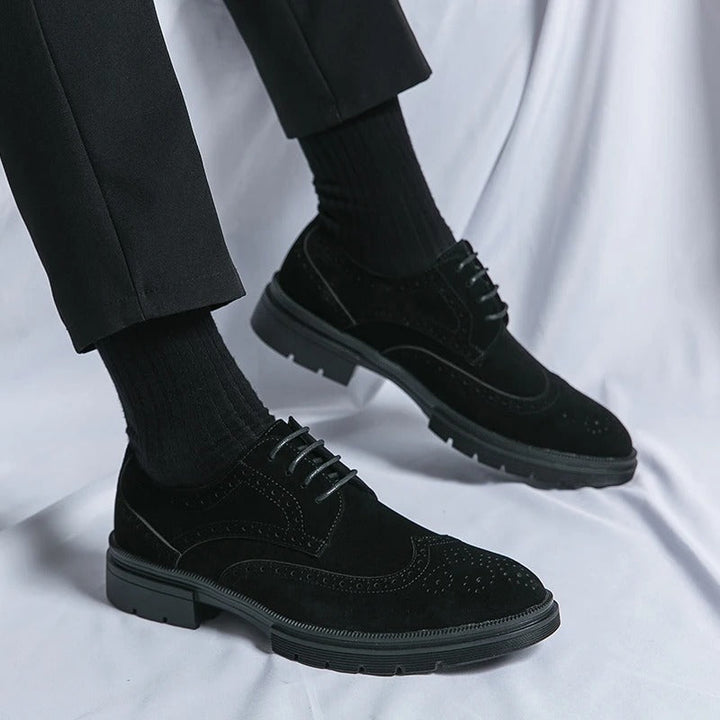 Men's classic brown suede brogue shoes. Durable comfort footwear with timeless appeal for any formal outfit.