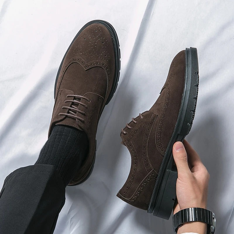 Stylish brown suede brogues for men. Dress shoes with classic style, offering all-day comfort for any occasion.