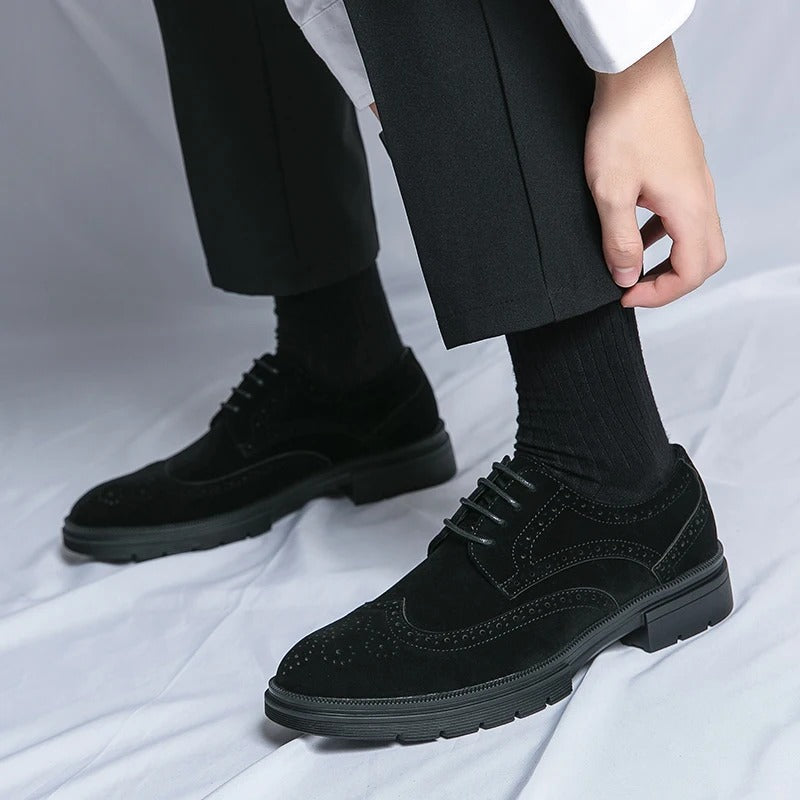 Sophisticated men's suede brogues in black, blending classic style with modern comfort for dress or casual shoes.
