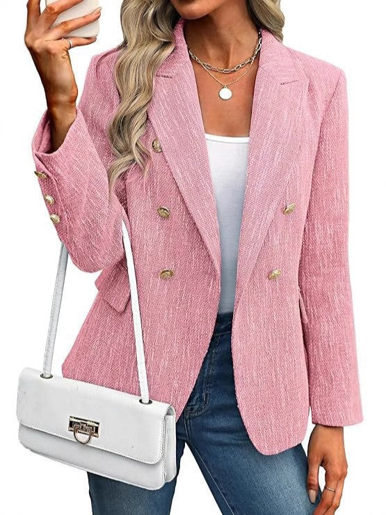 Textured double-breasted women's blazer with shiny gold buttons. Adds a sophisticated touch to any ensemble.