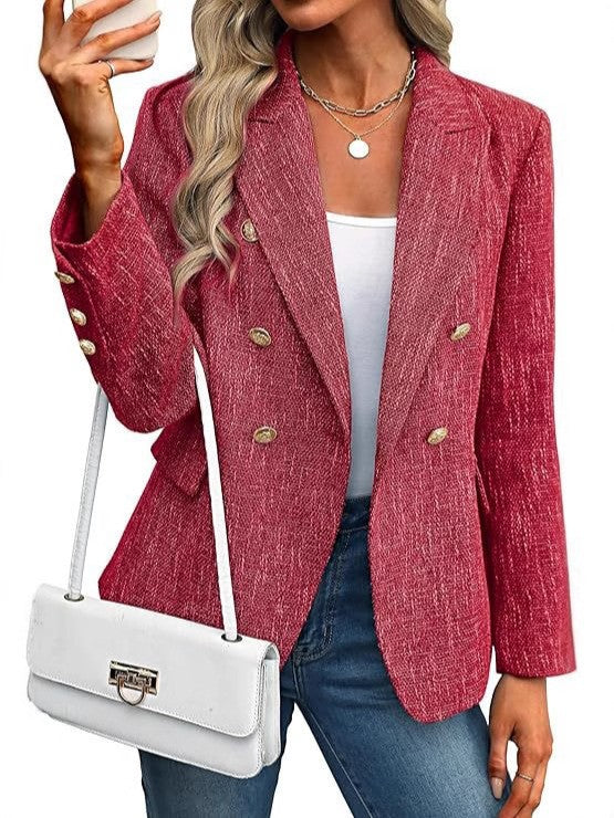 Stylish women's double breasted blazer featuring polished gold buttons. Perfect for business casual looks.