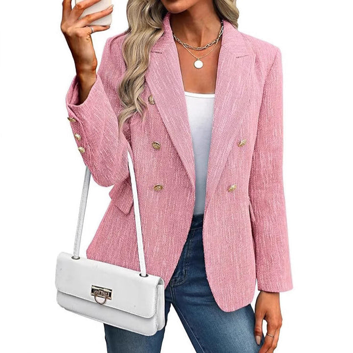 Elegant women's gold button double-breasted blazer. Textured fabric adds sophistication to professional attire.