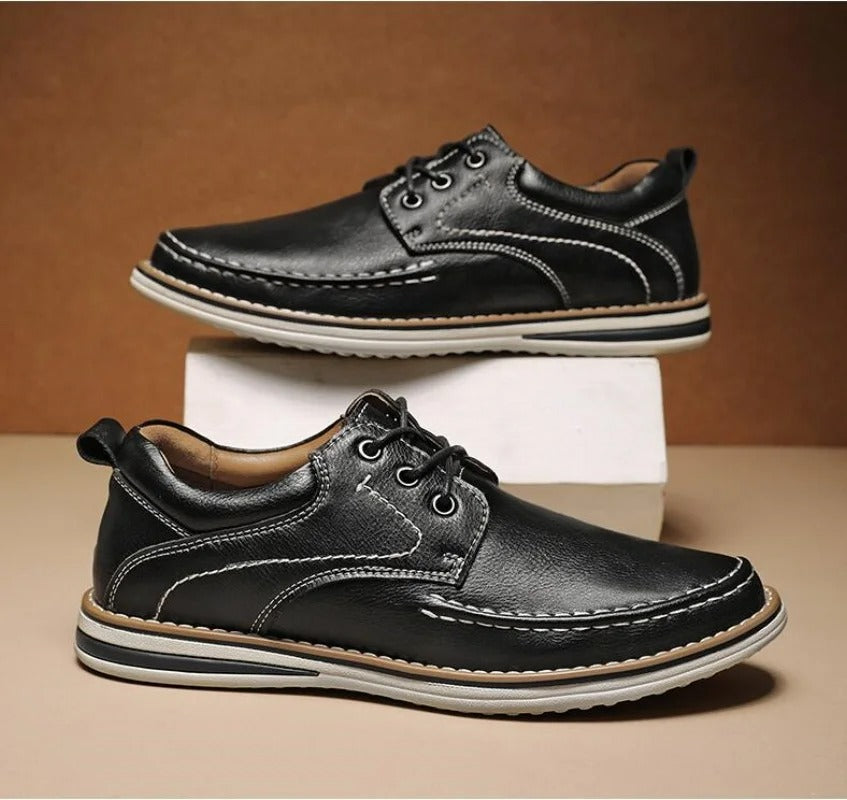 Men's brown leather moc toe oxfords, classic comfort & versatile style for various occasions.