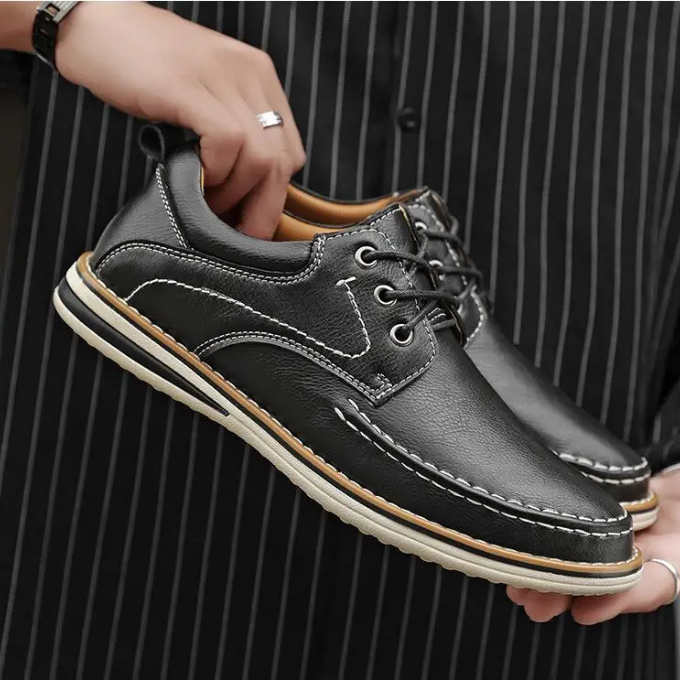 Smart black men's moc oxfords, classic footwear for formal events or everyday professional look.