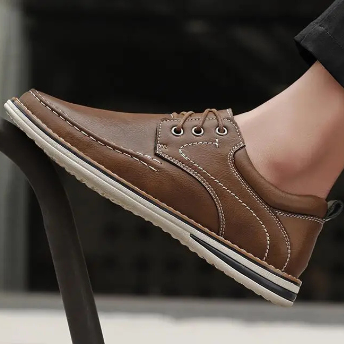 Stylish black men's moc oxfords, classic and versatile for formal or casual outfits.