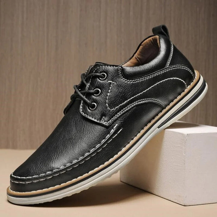 Black men's moc toe oxfords, durable and versatile, perfect for business casual or events.