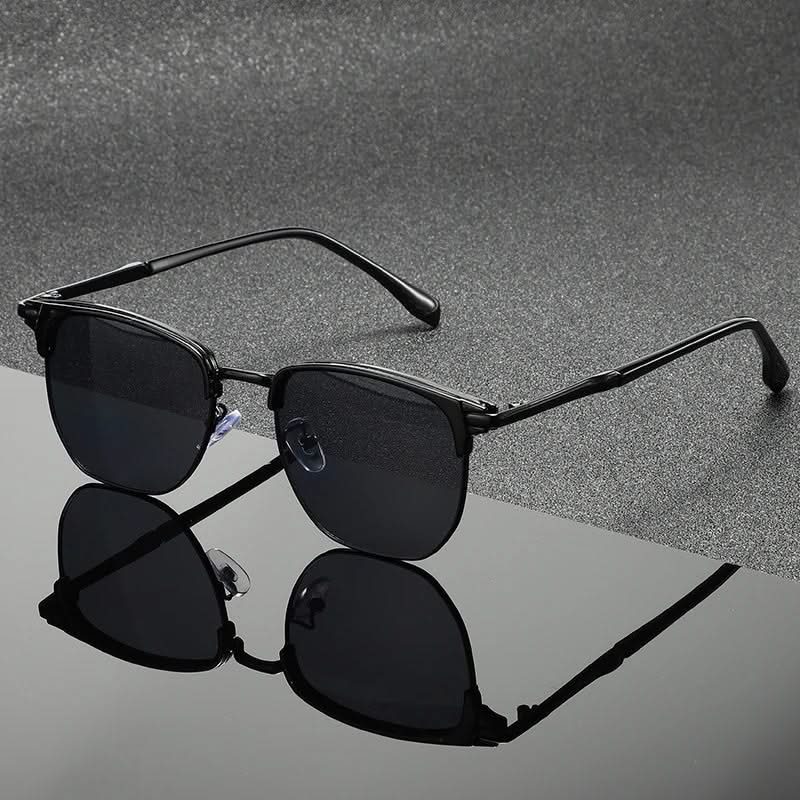 Close-up of classic Clubmaster sunglasses, showcasing timeless design & quality craftsmanship.