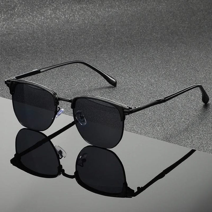 Close-up of classic Clubmaster sunglasses, showcasing timeless design & quality craftsmanship.