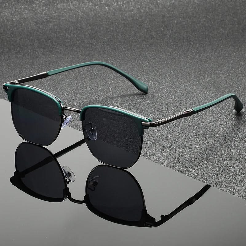 Model wearing elegant Clubmaster sunglasses, exuding confident style with fashionable eye protection.