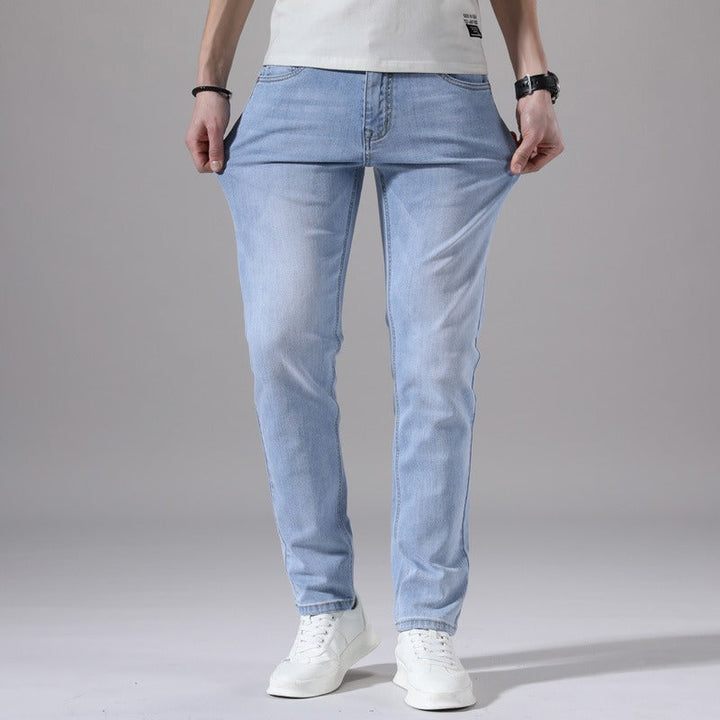 Versatile classic fit men's jeans in a comfortable everyday style. Essential for modern men's casual fashion.