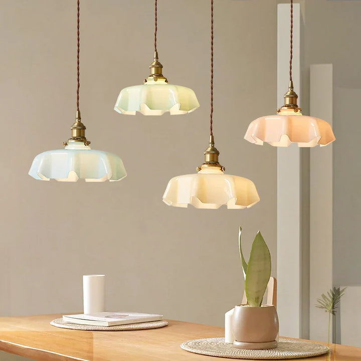 Elegant brass pendant lamp, ideal for vintage French decor, providing warm, stylish home lighting.