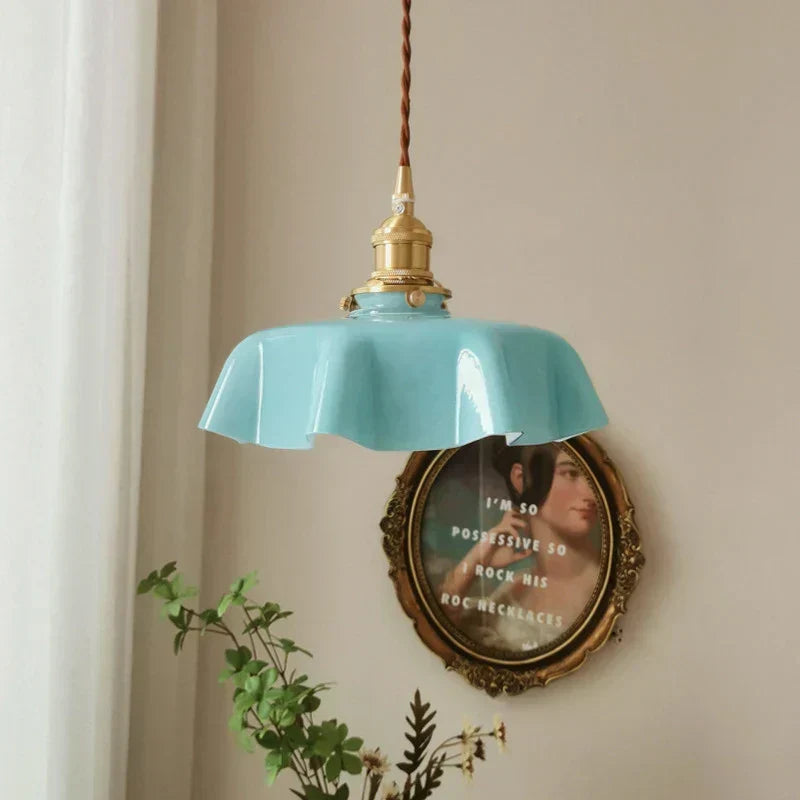 Decorative brass pendant light, perfect for dining room lighting and classic French home style.