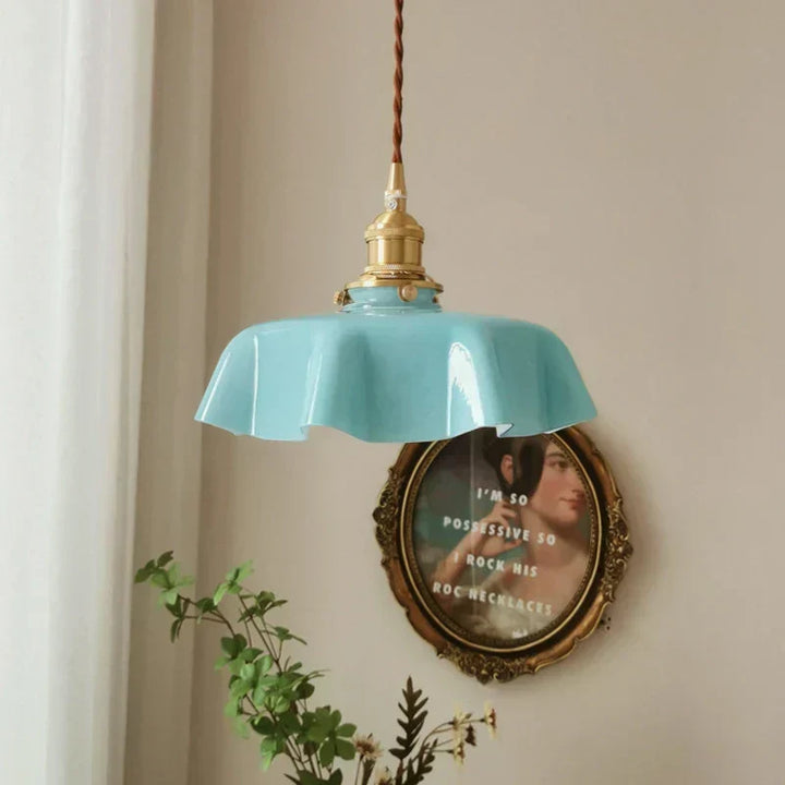 Decorative brass pendant light, perfect for dining room lighting and classic French home style.