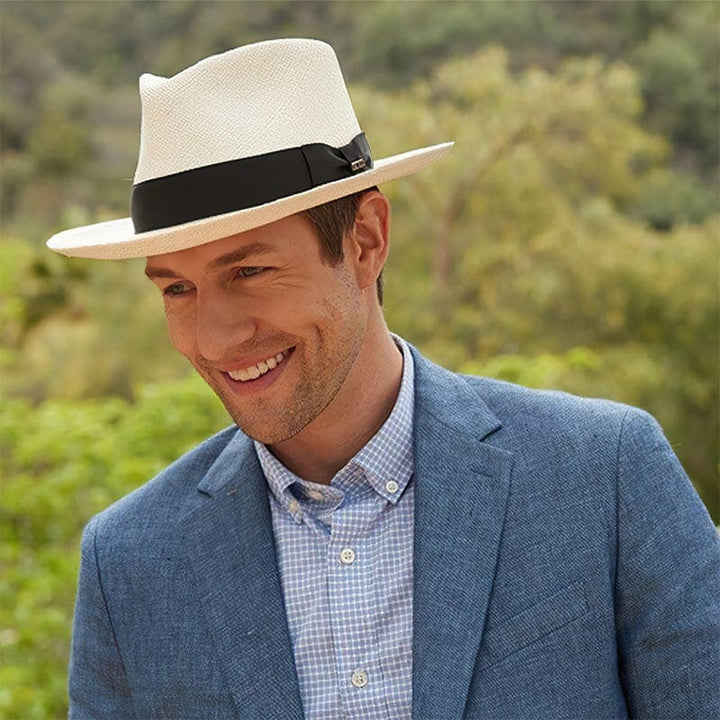 Handcrafted men's Panama hat. Classic style, natural Toquilla straw for excellent sun protection.
