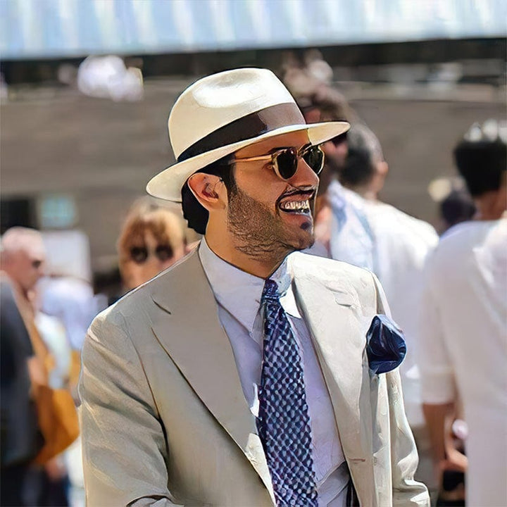 Gentleman's classic Panama hat, handmade for summer. Lightweight straw offers superior UV protection.