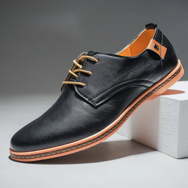 Classic men's black leather lace-up dress shoes. Versatile formal footwear for business, events & everyday style.