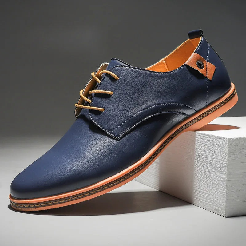 Elegant men's brown leather lace-up dress shoes. Comfortable and versatile, ideal for professional or formal wear.