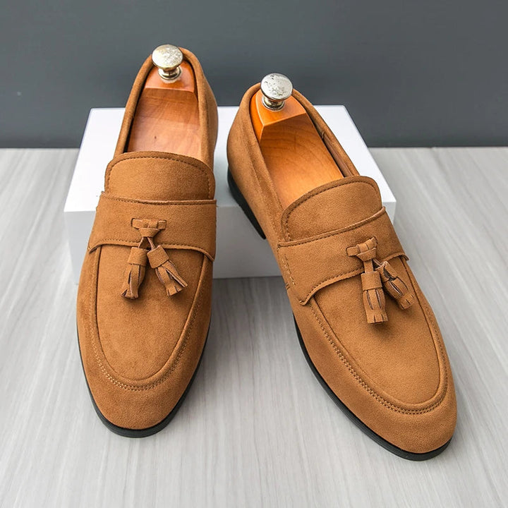 Comfortable men's slip-on loafers with tassels, perfect smart casual footwear for office or everyday.