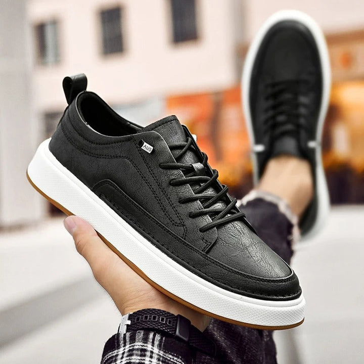 Stylish men's brown leather sneakers, perfect footwear for urban casual comfort.