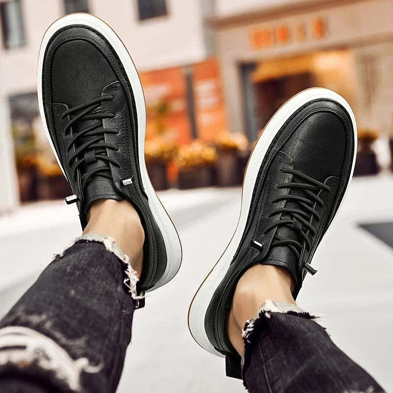 Men's classic black leather footwear, comfortable and stylish for urban adventures.