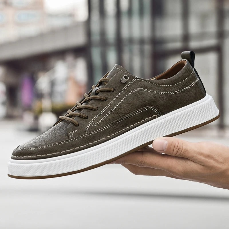 Stylish black leather men's sneakers, perfect for casual wear & comfort.