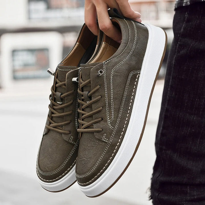 Durable men's classic leather sneakers, ideal footwear for urban casual style.