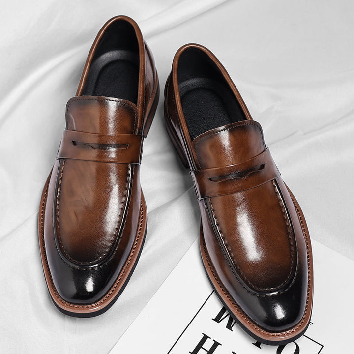 Comfortable men's classic slip-on penny loafers, perfect for everyday sophistication and ease.