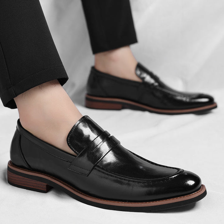 High-quality men's brown penny loafers, offering classic style and everyday slip-on comfort.