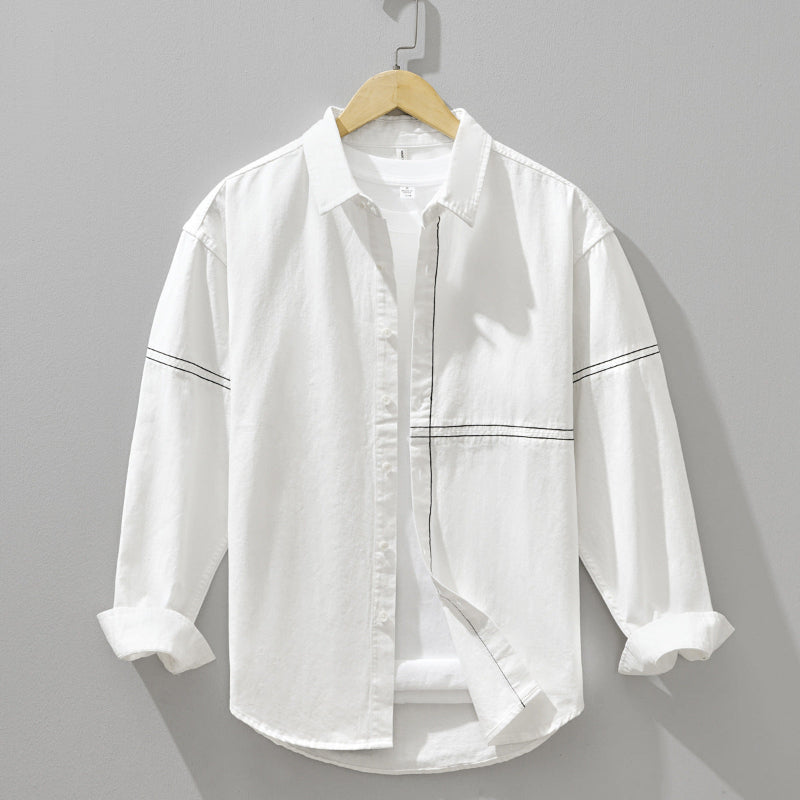 Classic men's button-down shirt, long sleeve, versatile for casual or formal everyday style.