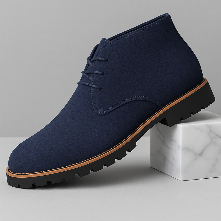 Classic men's chukka boots, stylish lace-up ankle footwear for versatile casual & formal outfits.
